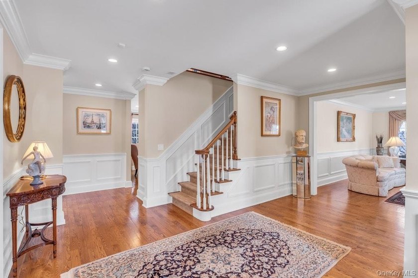 This Flower Hill Center Hall Colonial spans 3,600 square feet - photo 4