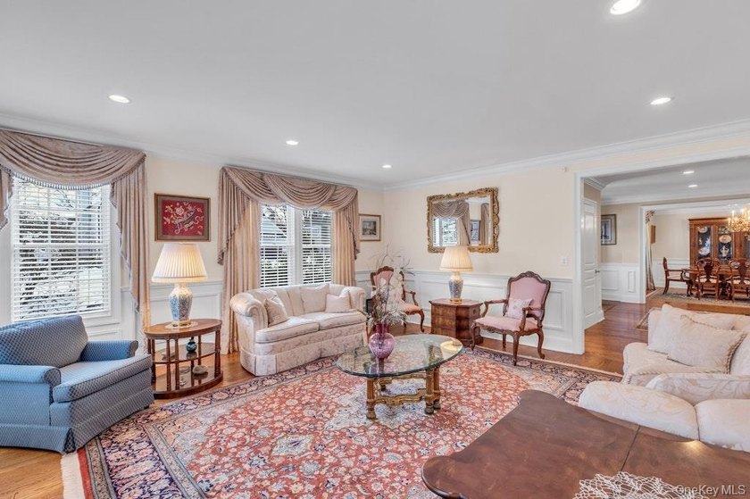 This Flower Hill Center Hall Colonial spans 3,600 square feet - photo 8