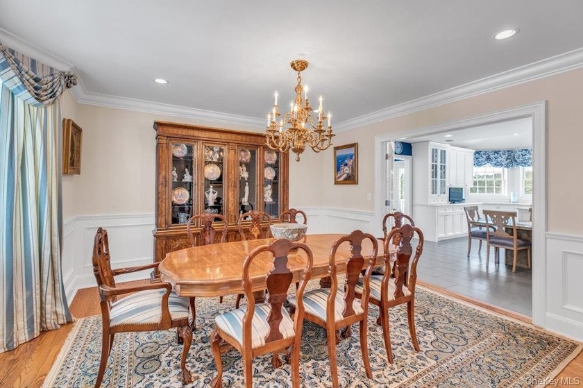 This Flower Hill Center Hall Colonial spans 3,600 square feet - photo 9