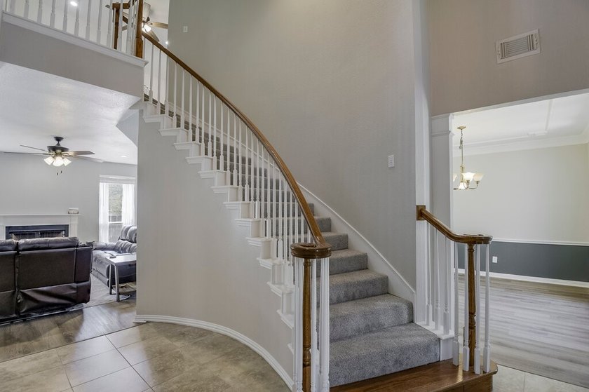 Welcome to this thoughtfully designed custom home in highly - photo 3