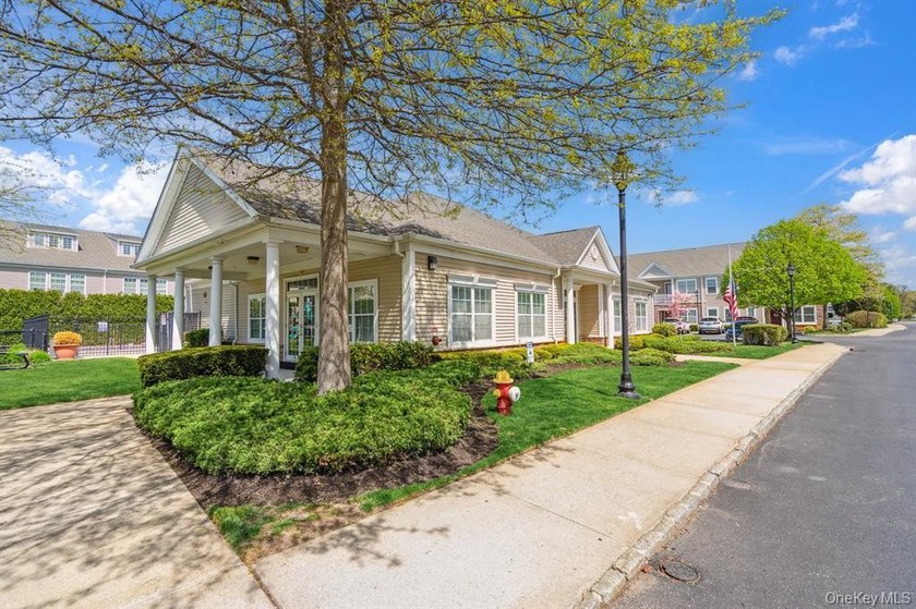 Welcome to this highly sought-after first-floor end unit located - photo 29