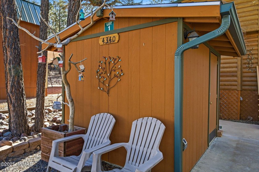 Nestled on a premium, private lot surrounded by towering pines - photo 10
