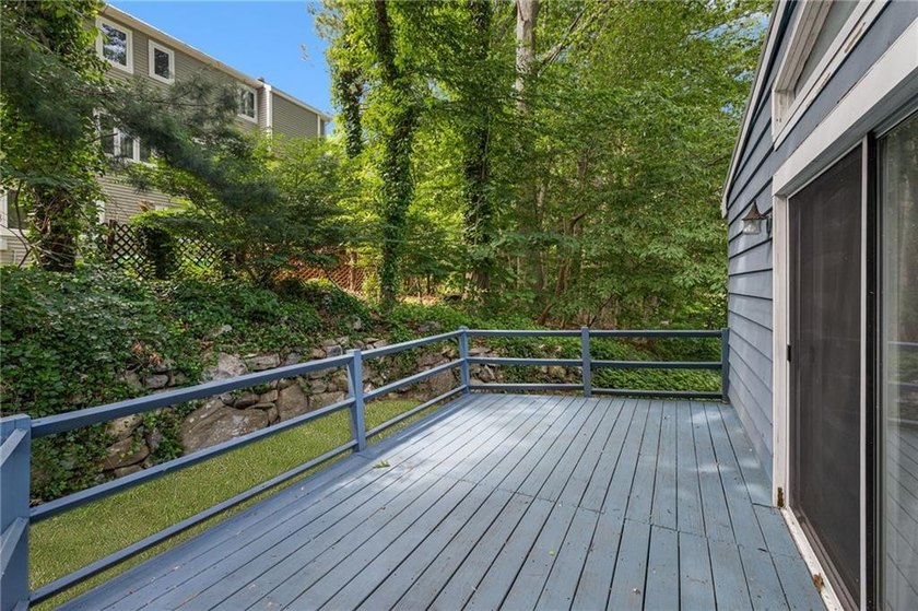 THIS OVERSIZED RAISED RANCH SITS IN A QUIET NEIGHBORHOOD IN - photo 13