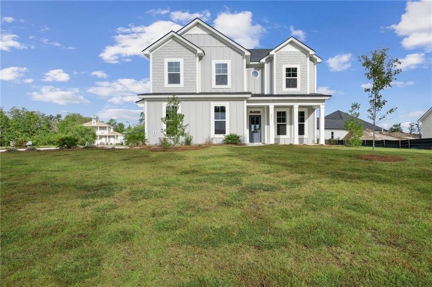 WELCOME HOME TO THE RICHMOND PLAN BY LANDMARK 24 HOMES! STEP - photo 5