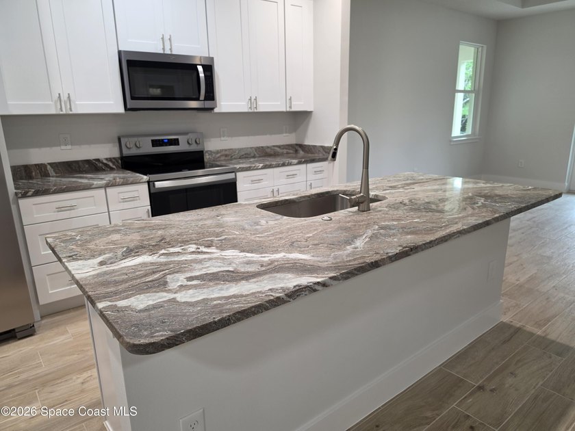 Completed and ready for immediate move-in! This truly - photo 18