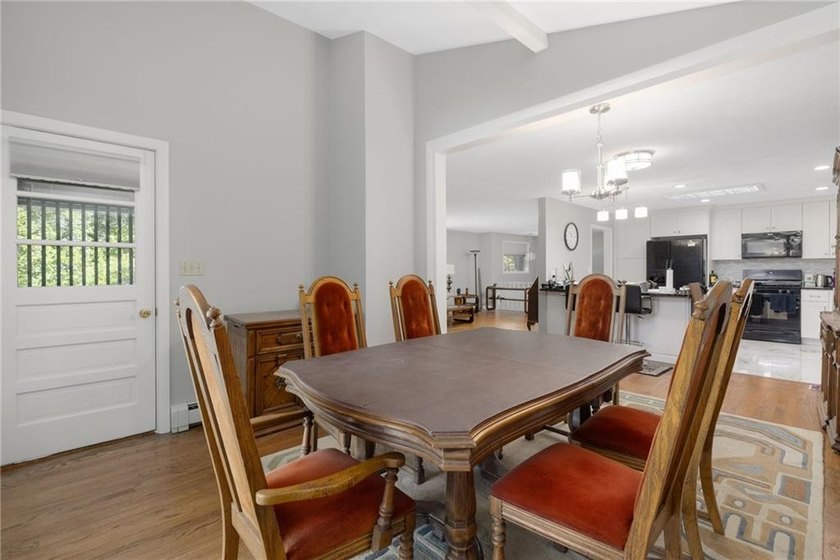 THIS OVERSIZED RAISED RANCH SITS IN A QUIET NEIGHBORHOOD IN - photo 18