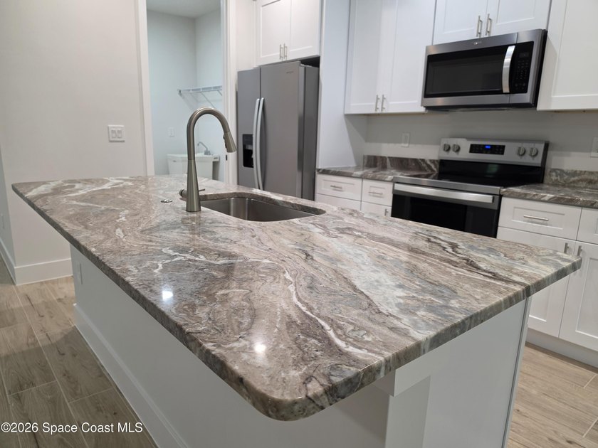 Completed and ready for immediate move-in! This truly - photo 19