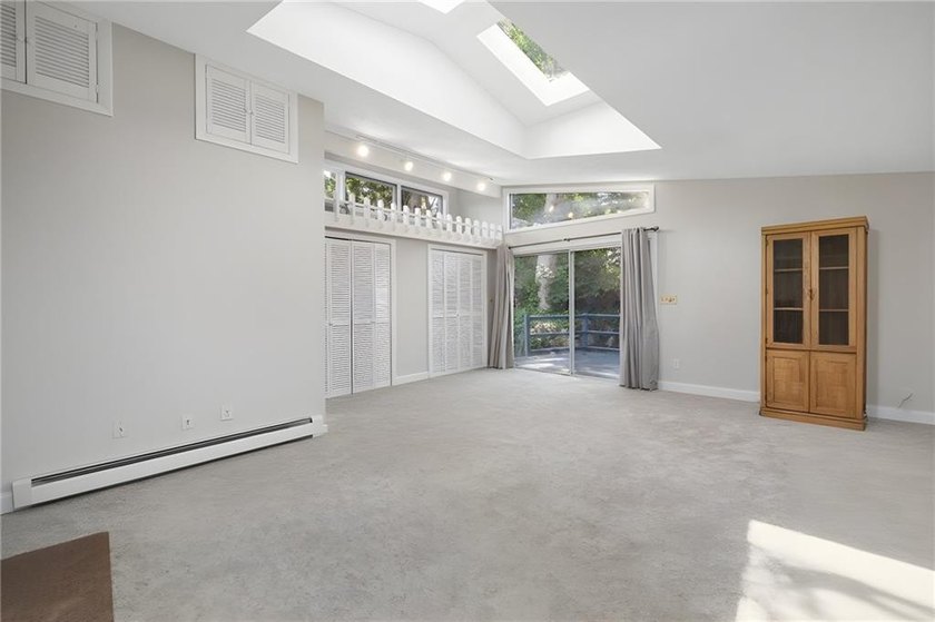 THIS OVERSIZED RAISED RANCH SITS IN A QUIET NEIGHBORHOOD IN - photo 21
