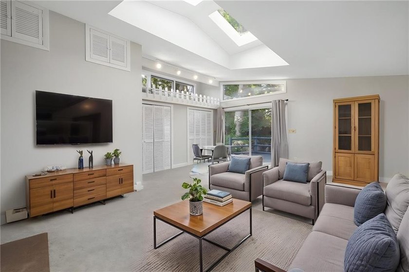 THIS OVERSIZED RAISED RANCH SITS IN A QUIET NEIGHBORHOOD IN - photo 22