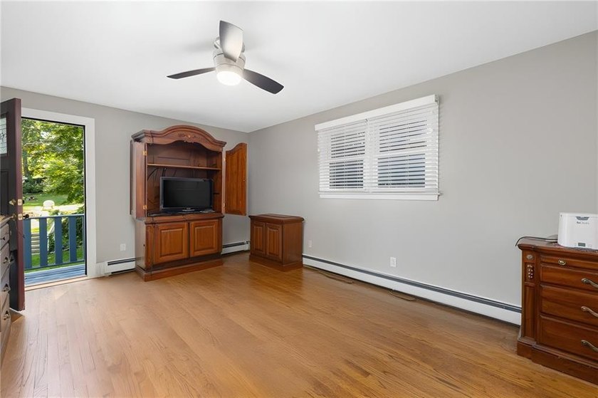 THIS OVERSIZED RAISED RANCH SITS IN A QUIET NEIGHBORHOOD IN - photo 24
