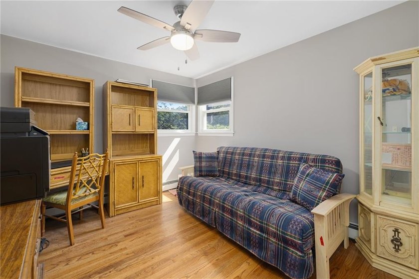 THIS OVERSIZED RAISED RANCH SITS IN A QUIET NEIGHBORHOOD IN - photo 27