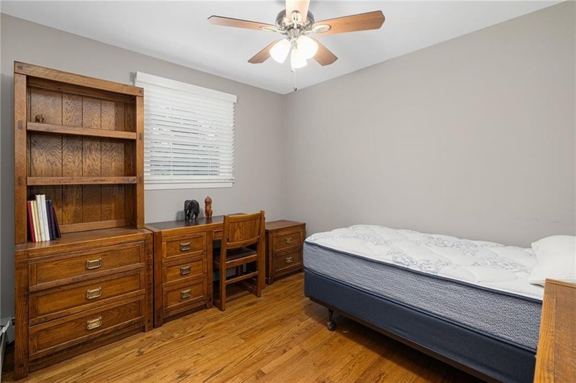 THIS OVERSIZED RAISED RANCH SITS IN A QUIET NEIGHBORHOOD IN - photo 28