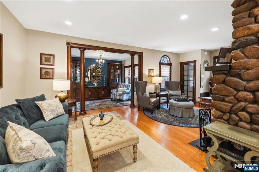 This home is gracefully positioned on a beautifully landscaped - photo 11