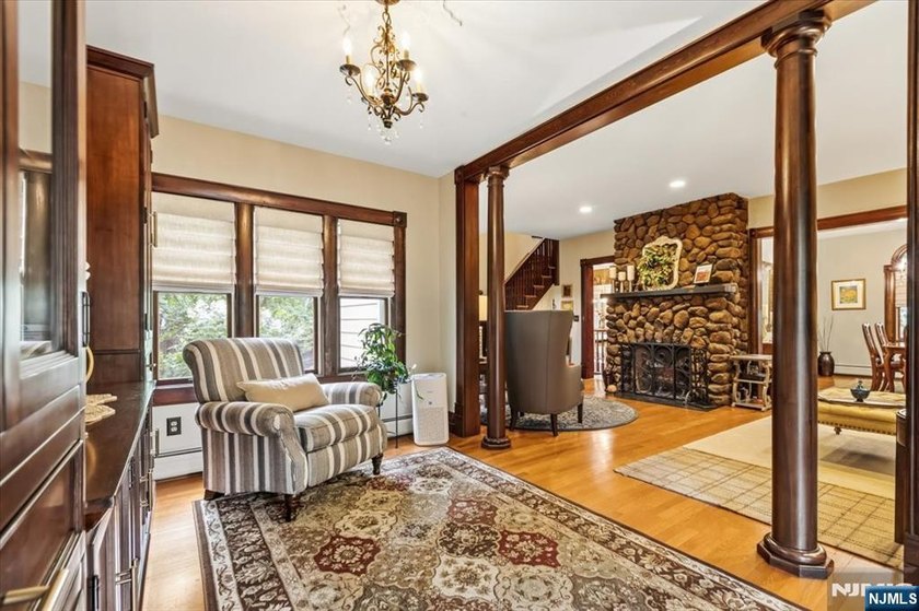 This home is gracefully positioned on a beautifully landscaped - photo 12