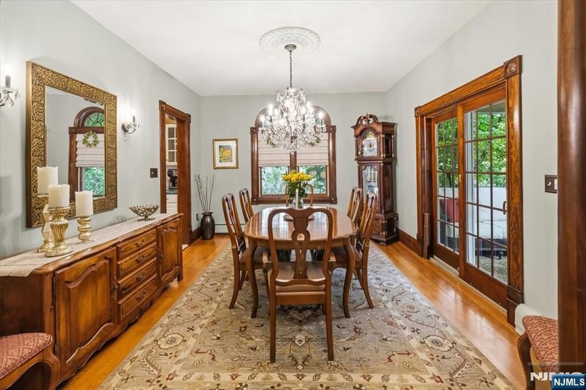 This home is gracefully positioned on a beautifully landscaped - photo 16