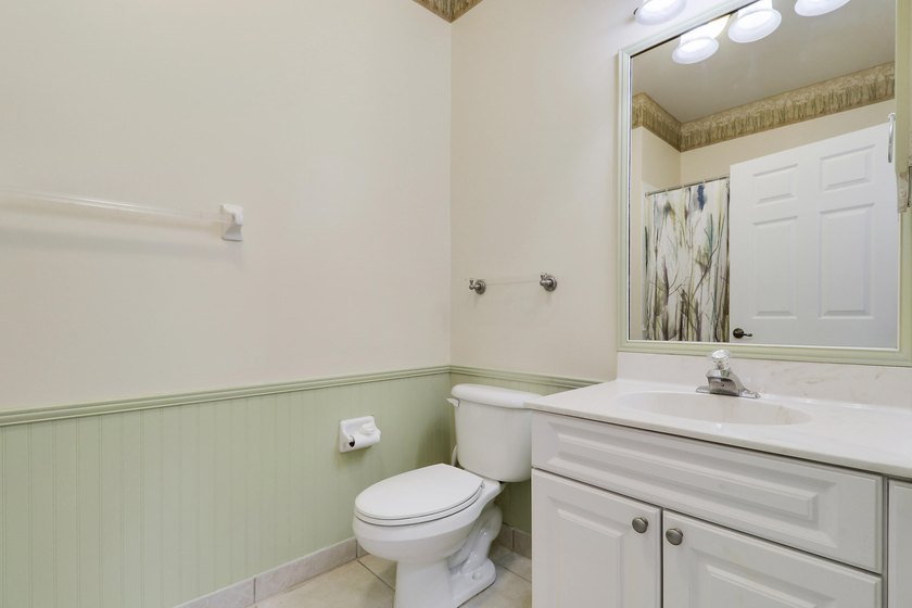 This spacious end-unit home is vacant and move-in ready! Tucked - photo 16