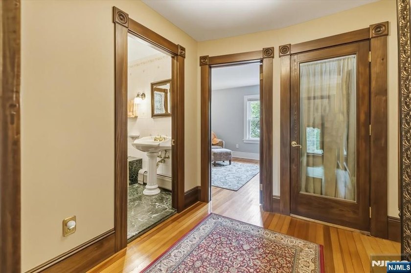 This home is gracefully positioned on a beautifully landscaped - photo 23