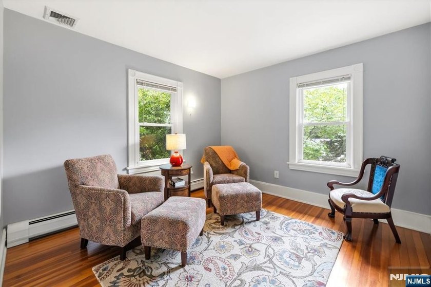 This home is gracefully positioned on a beautifully landscaped - photo 24