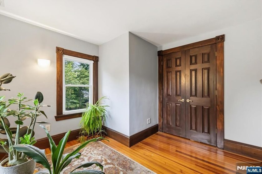 This home is gracefully positioned on a beautifully landscaped - photo 25