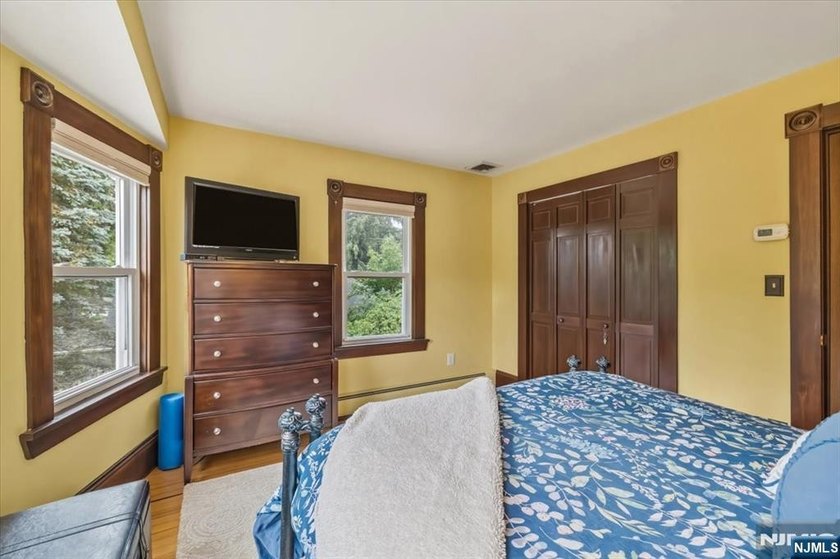 This home is gracefully positioned on a beautifully landscaped - photo 27
