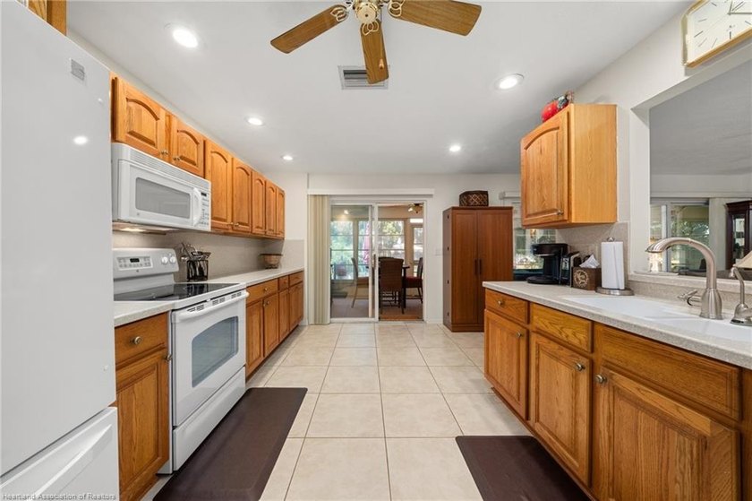 Immaculate Waterfront Living with Direct Lake Access! Nestled on - photo 12