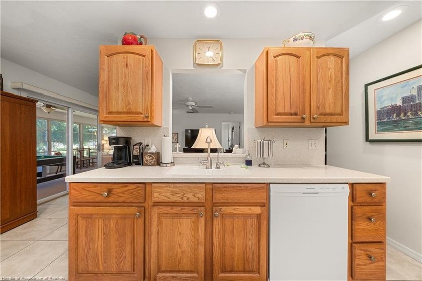 Immaculate Waterfront Living with Direct Lake Access! Nestled on - photo 13