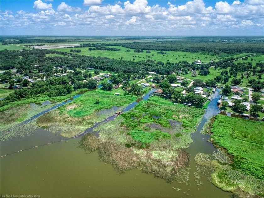 Immaculate Waterfront Living with Direct Lake Access! Nestled on - photo 42