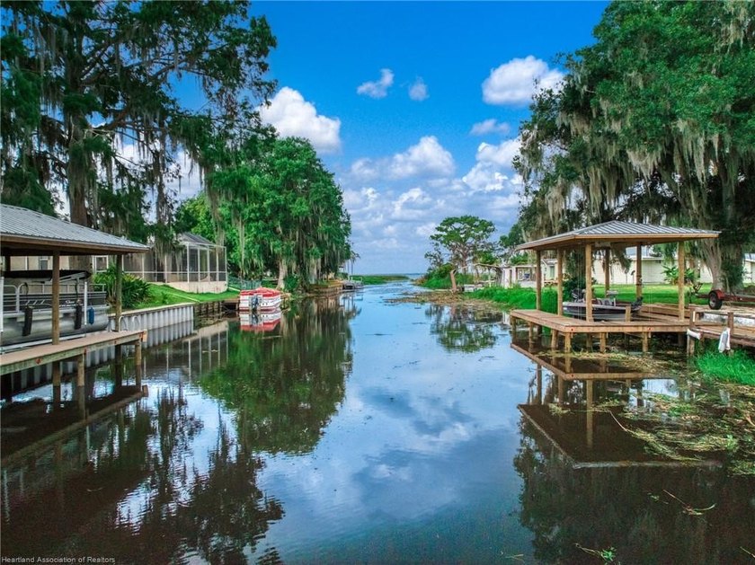 Immaculate Waterfront Living with Direct Lake Access! Nestled on - photo 46