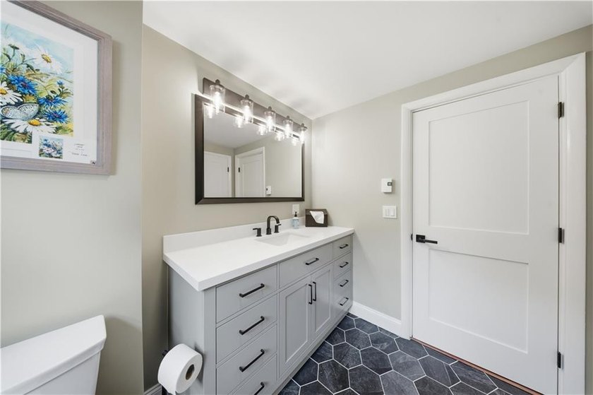 Situated on a one-acre lot along a private road, this - photo 20