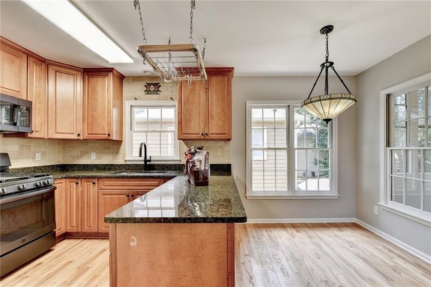 Welcome to this beautifully updated 5-bedroom, 3-bathroom home - photo 27