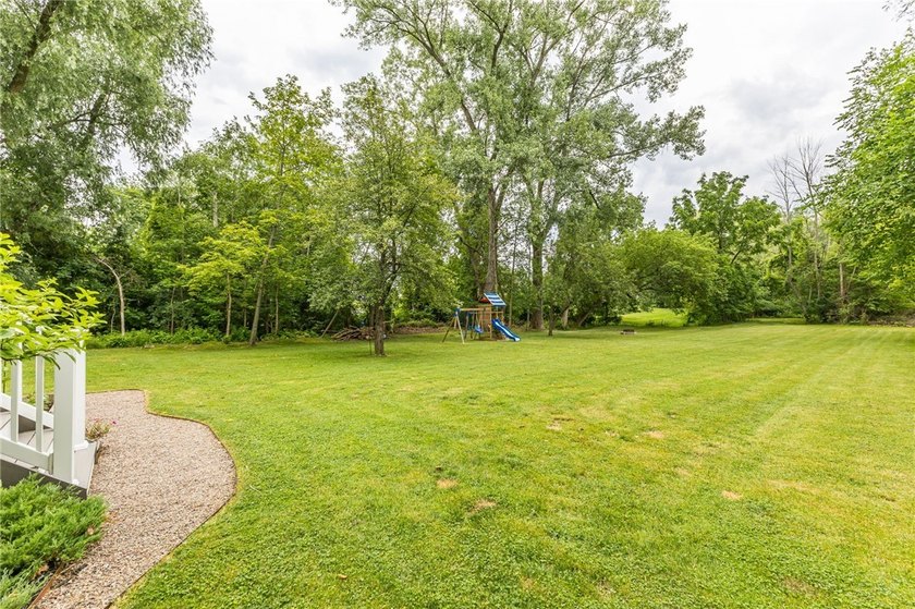 Exceptional and move-in ready split-level gem in the highly - photo 40