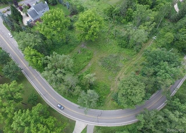 This 1.45 acre partially wooded parcel is located within minutes - photo 2