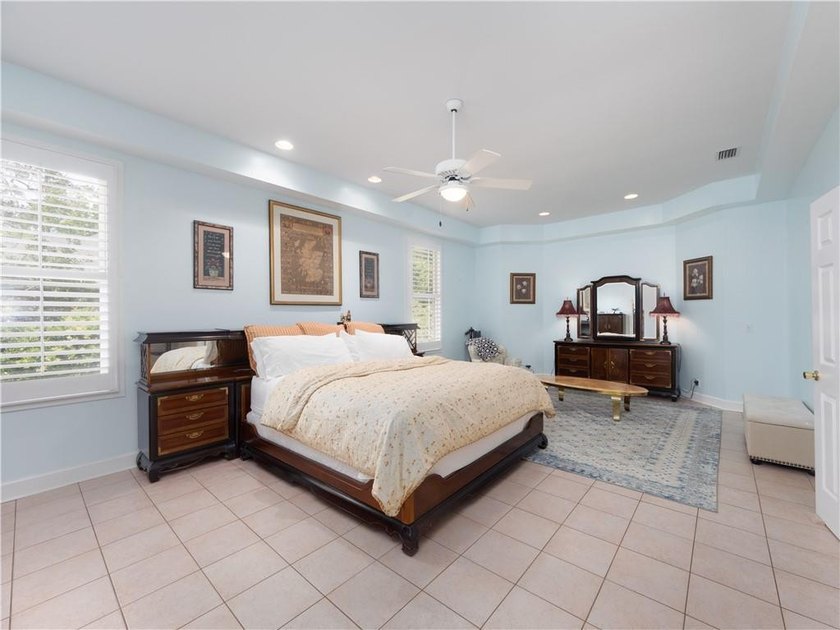 Positioned in the prestigious Hampton Point Subdivision, this - photo 3