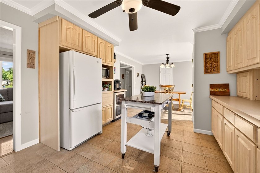 Open Saturday 11:00-1:00!! Welcome to 768 Dewitt Road! Tucked - photo 11