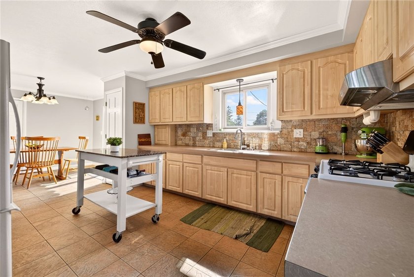 Open Saturday 11:00-1:00!! Welcome to 768 Dewitt Road! Tucked - photo 14