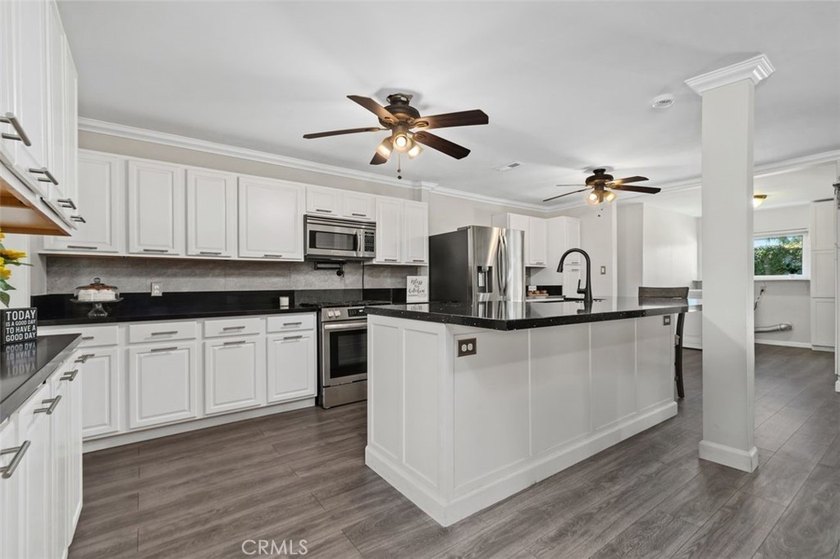 Welcome to 8702 Davmor Avenue, a lovely four-bedroom - photo 8
