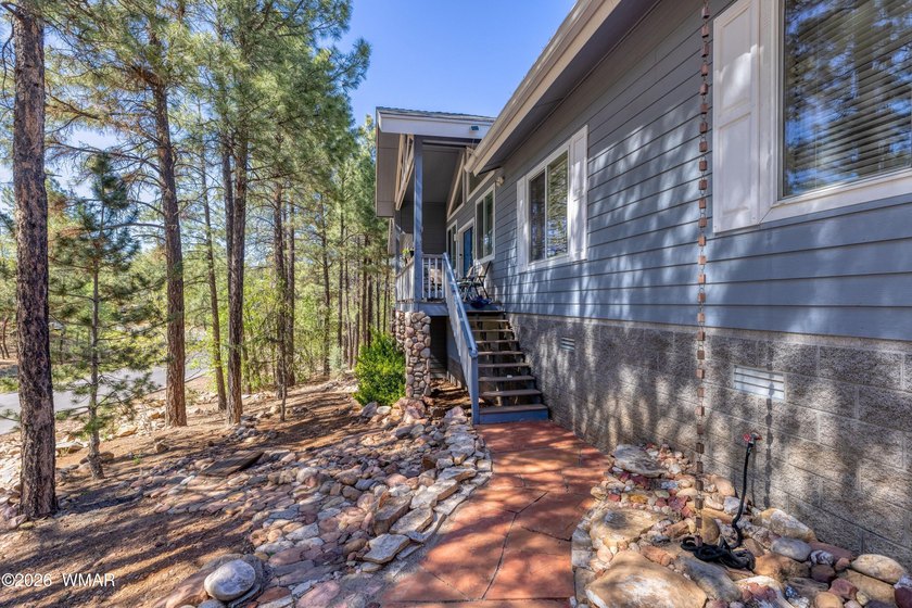 Nestled among the tall pines and bordering National Forest! This - photo 5