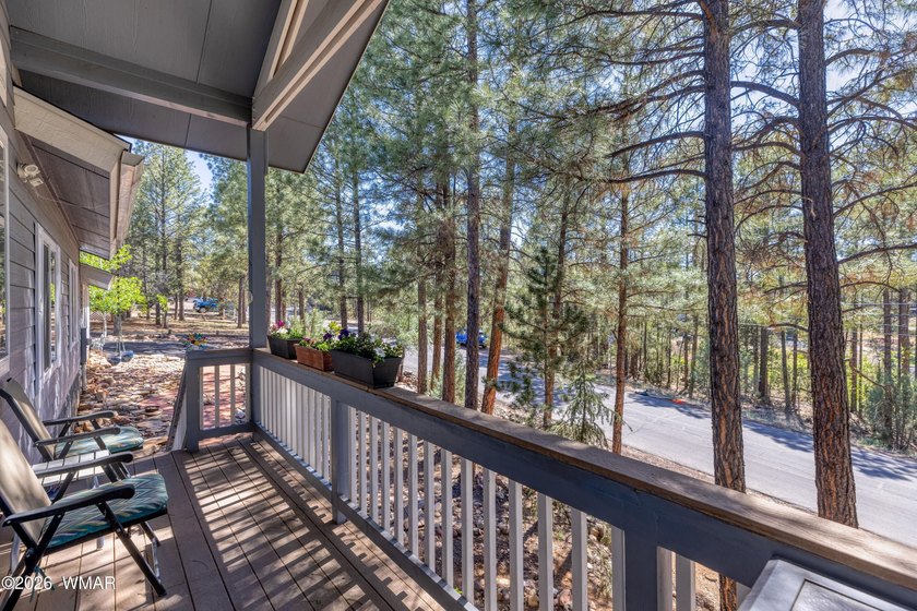 Nestled among the tall pines and bordering National Forest! This - photo 6