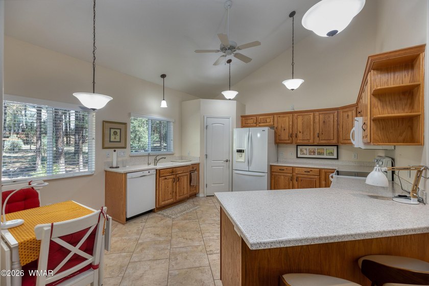 Nestled among the tall pines and bordering National Forest! This - photo 10