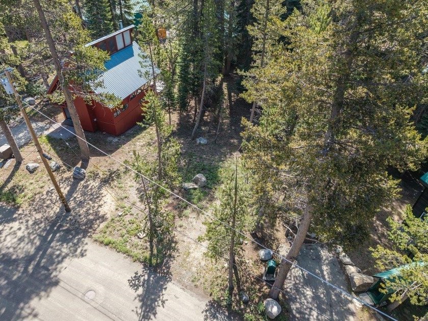 A lovely wooded lot ready for your Serene Lakes dream home! Home - photo 2