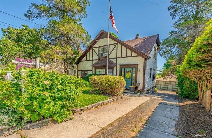 Picture-perfect 3-bedroom, 1.5-bath Tudor set on a tree-lined - photo 30