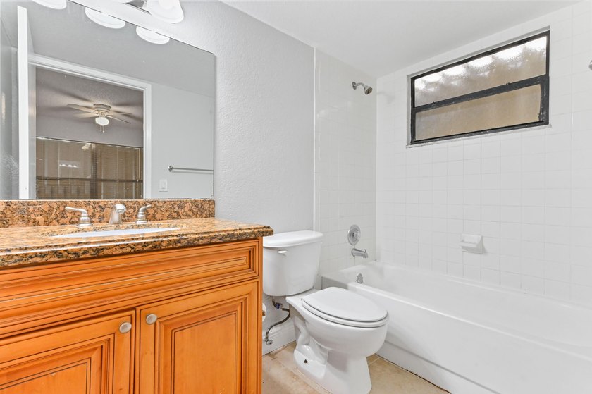 Step into this inviting 2-bedroom, 2-bath condo located in the - photo 15