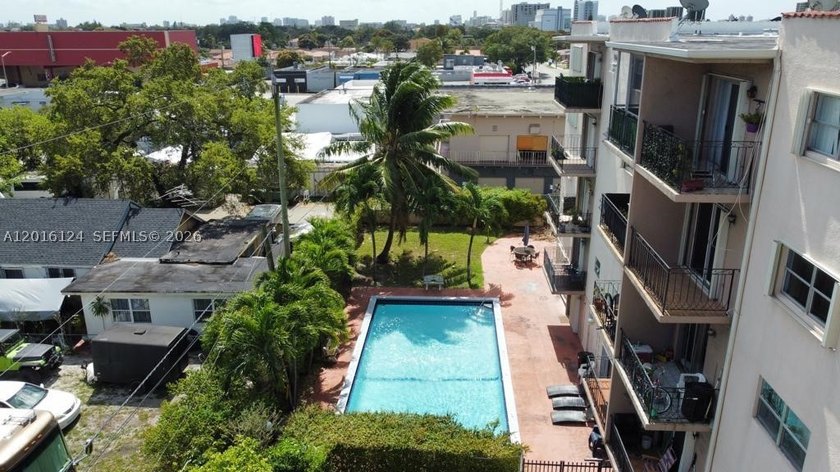 Charming 2-bedroom, 1-bath condo featuring a private balcony and - photo 31
