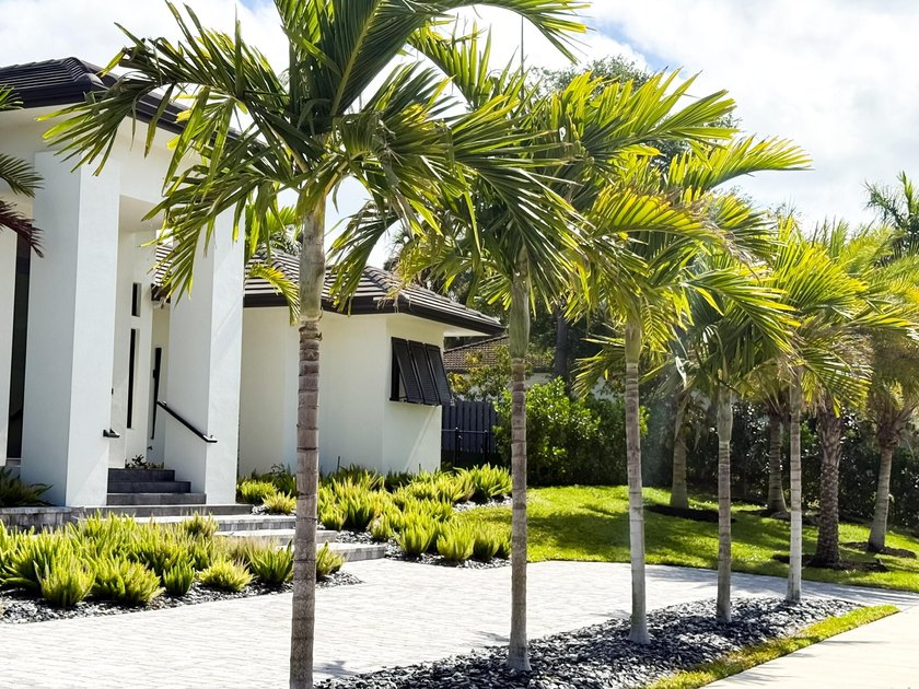 Welcome to 1702 Ludlow Road, a custom home situated on an - photo 2