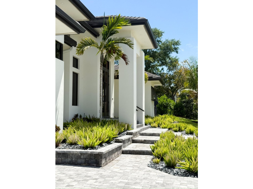 Welcome to 1702 Ludlow Road, a custom home situated on an - photo 5