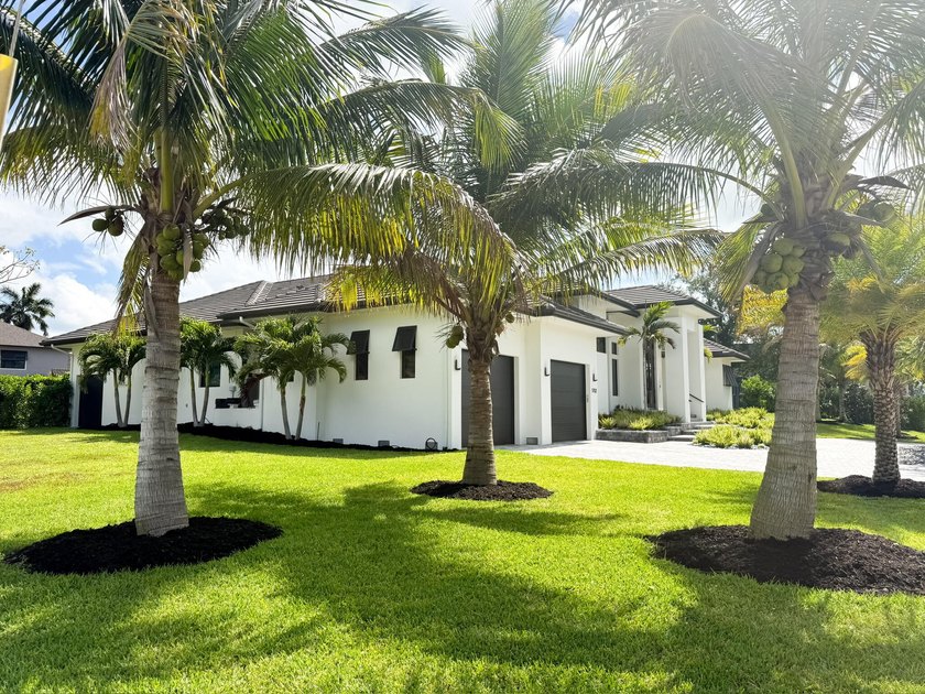 Welcome to 1702 Ludlow Road, a custom home situated on an - photo 8