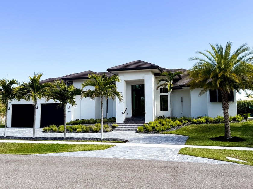 Welcome to 1702 Ludlow Road, a custom home situated on an - photo 10