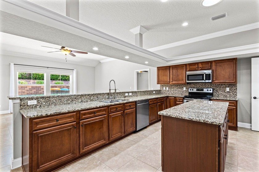 This home has a 3% assumable VA mortgage but that's not even the - photo 13