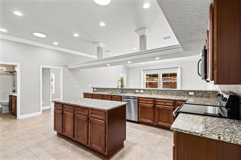 This home has a 3% assumable VA mortgage but that's not even the - photo 15
