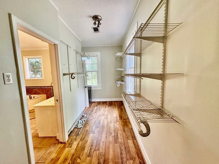 Charming and affordable 3-bedroom, 1-bath brick home! Features - photo 3